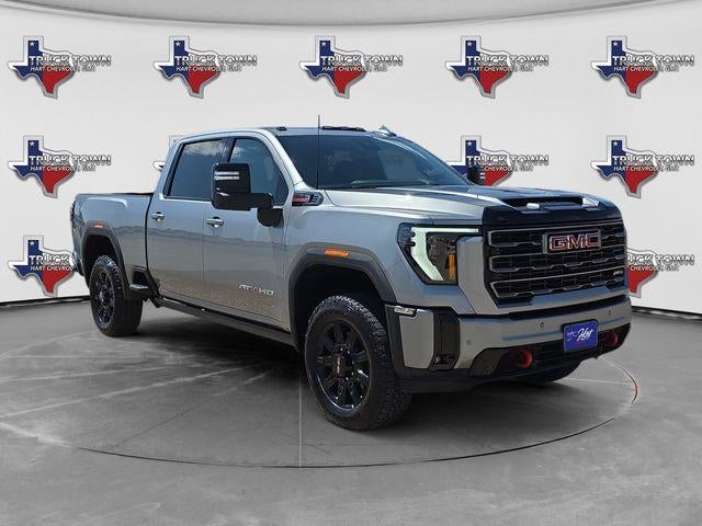 2026 GMC Sierra 2500 HD AT4 in Sterling Metallic — front three-quarter view